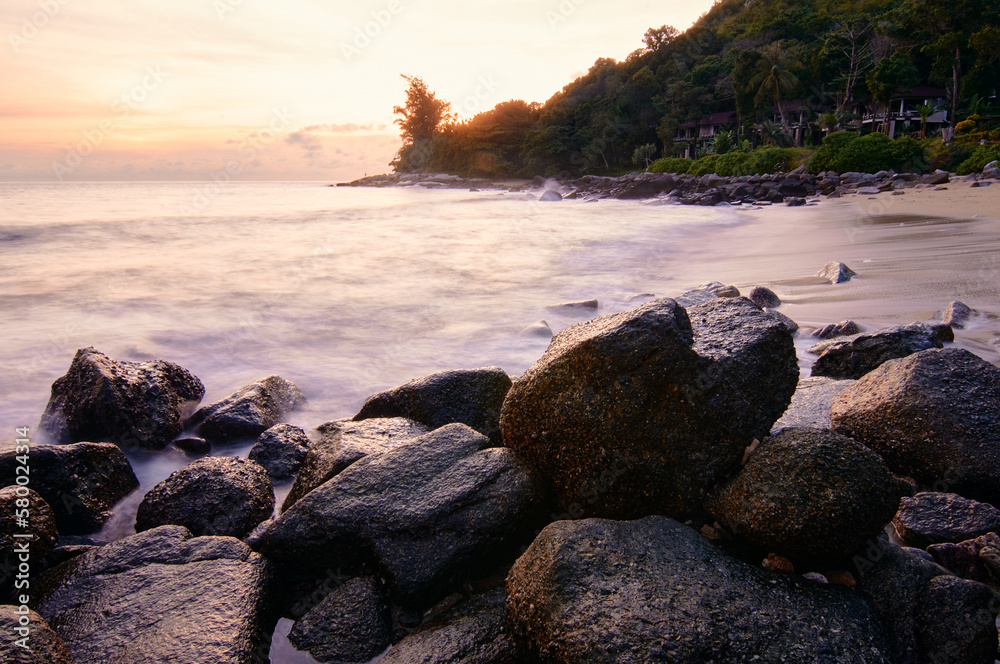 Beautiful landscape with colorful sunset on the sea rock beach. Beautiful landscape with colorful sunset on the sea rock beach.