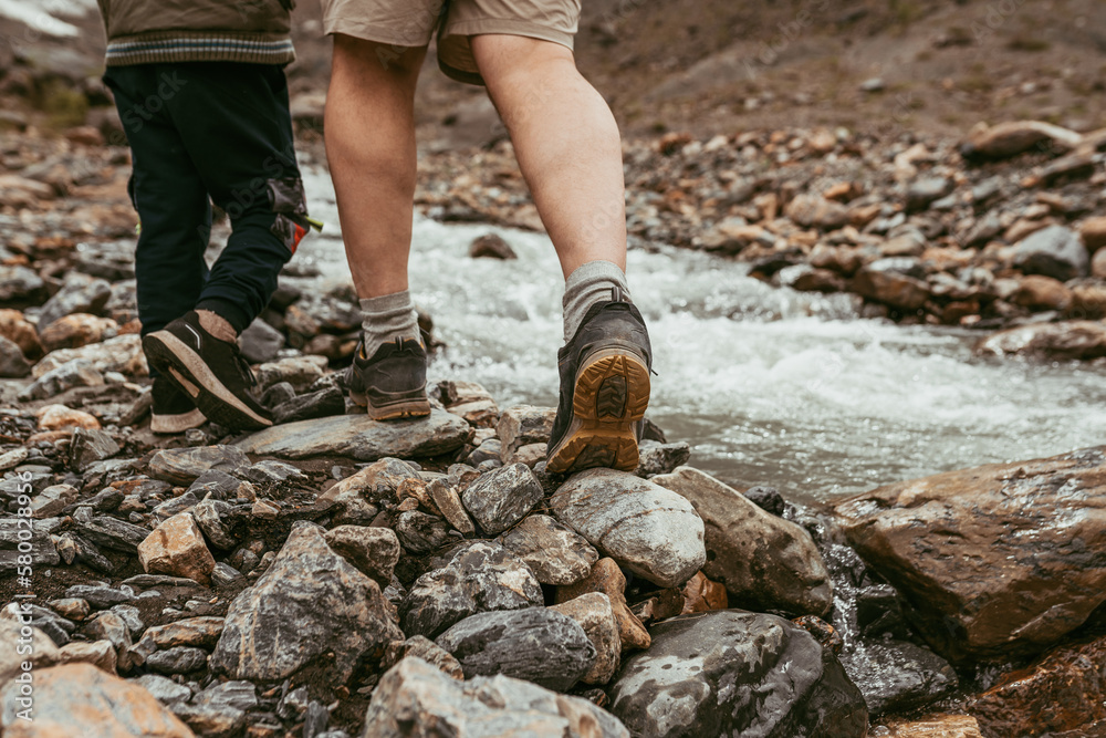 Fototapeta premium Father and son walking in the mountains 