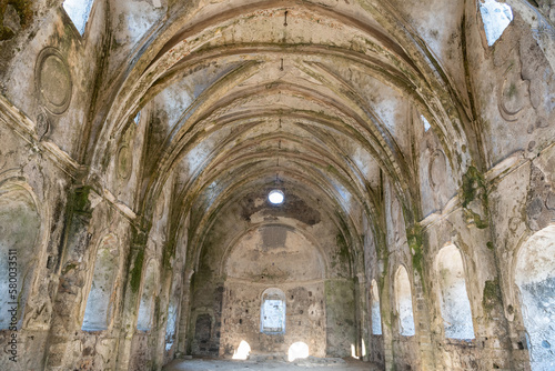 Interior view of ruined Taksiyarhis upper church of Kayakoy (Levissi) abandoned village near Fethiye in Mugla province of Turkey. photo