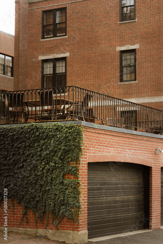 brick garage with vines