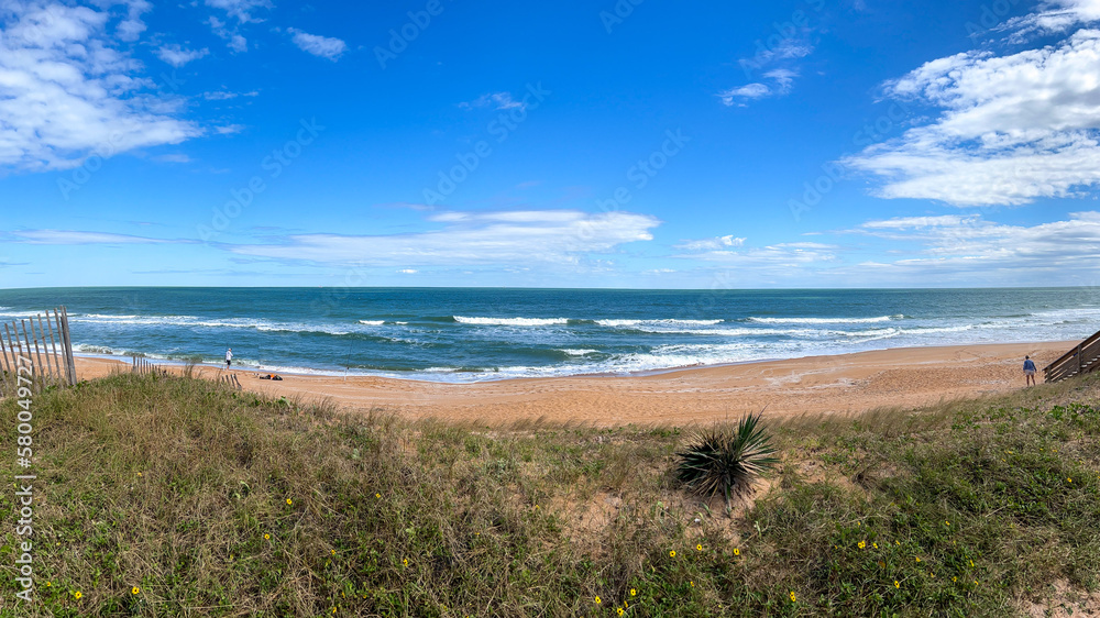 The shore of the Atlantic Ocean with Seagulls on a sunny day at Fort Clinch State Park in Florida. The shore of the Atlantic Ocean with Seagulls on a sunny day at Fort Clinch State Park in Florida.