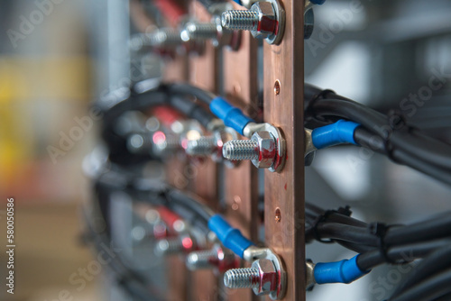 Photos Closeup of electrical wires in copper busbars