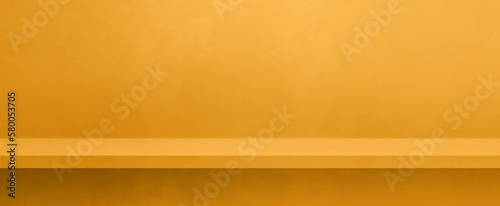 Wallpaper Mural Empty shelf on a yellow gold concrete wall. Background template. Horizontal banner mockup Torontodigital.ca