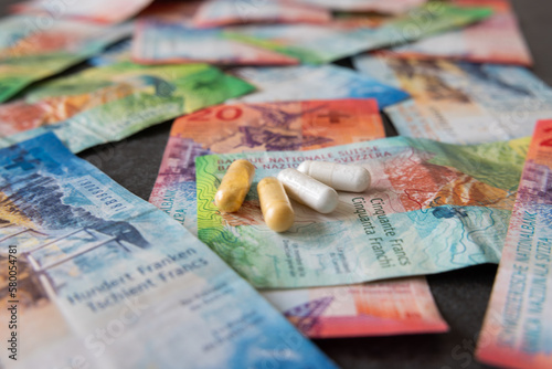 Medicines are symbolically placed on the Swiss franc banknotes. The inflation does not stop in the pharmacy either. photo