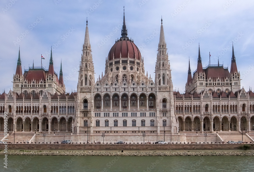 Budapest, Hungary - 15.05.2015: Wide frontal horizontal shot of Budapest parliament, Orszaghaz, from Danube river.