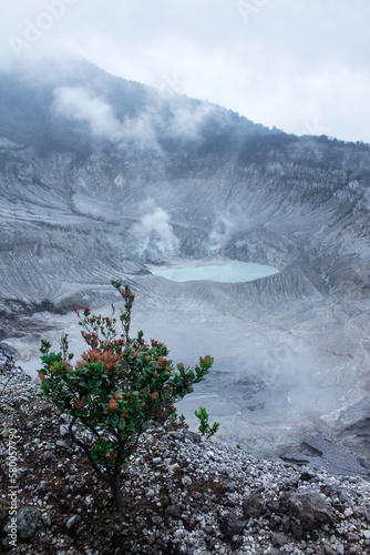White crater emitting smoke on mount tangkuban parahu, bandung, west java, indonesia photo