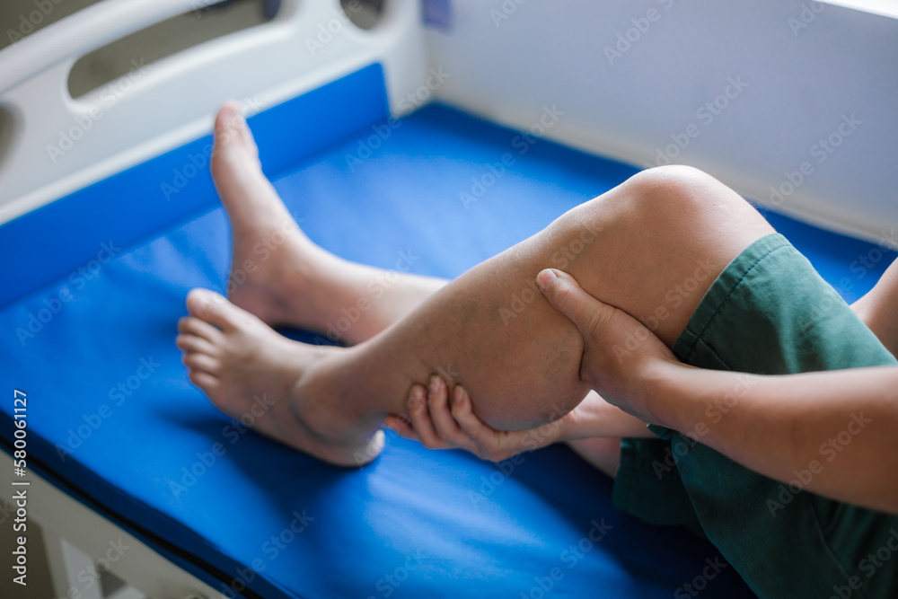 man with pain in foot