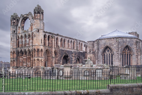 Elgin Cathedral, a historic ruin in Elgin, Moray, north-east Scotland. Ruin of old Scottish church on a cold cloudy day of late summer. photo