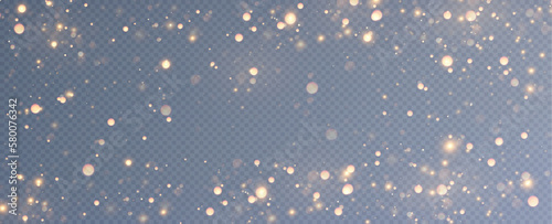 Golden sequins glow with many lights. Glittering dust. Luxurious background of golden particles.