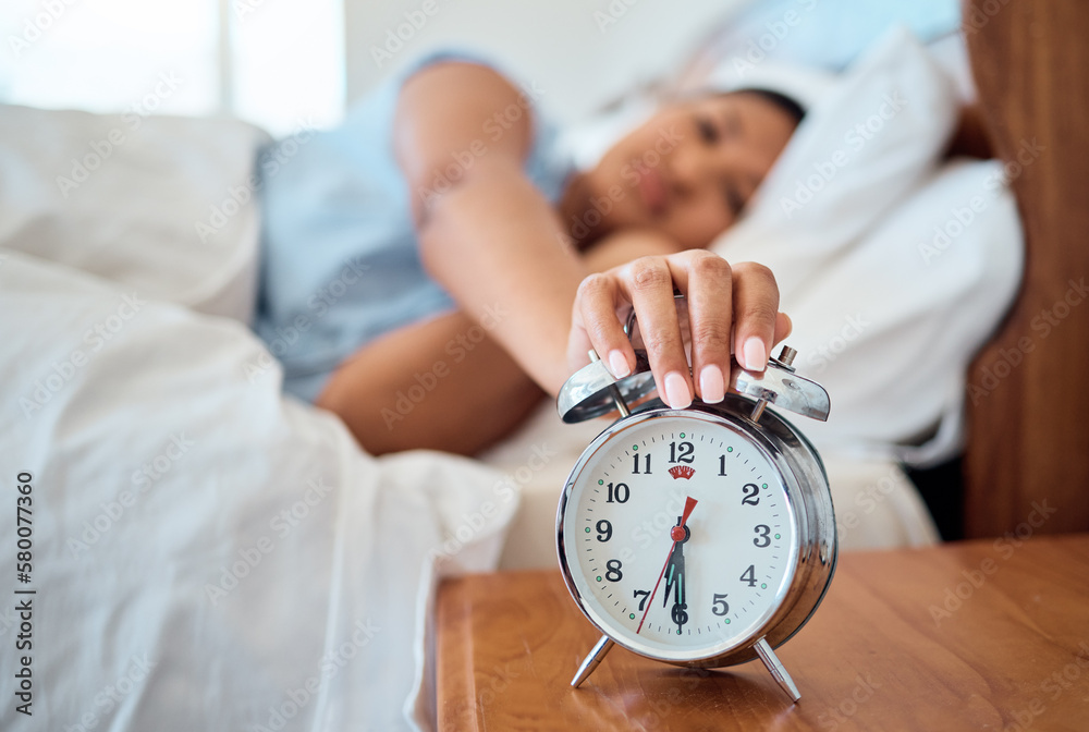Alarm clock, bedroom and woman stop time to wake up from early morning  sleeping at home,