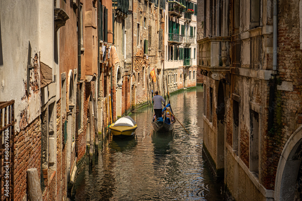 narrow canal with gondola
