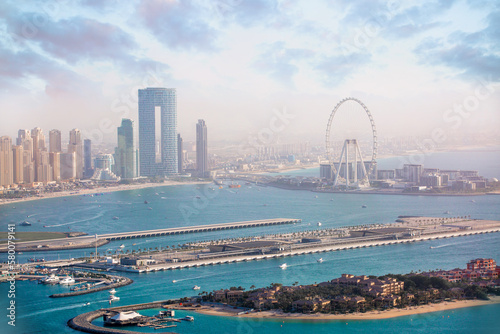 Dubai marina view with white sand beaches, Dubai Eye and skyscrapers © IRStone