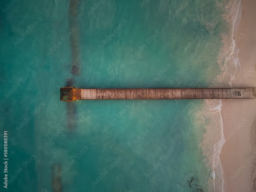 Aerial view. Turquoise sea, white sandy beach and bridge. There are no people in the photo. beautiful nature, recreation, vacation, tourism, ecology, environmental protection.