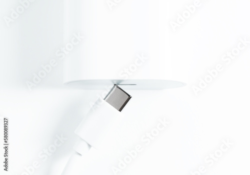 Charger and USB Type-C cable on white background