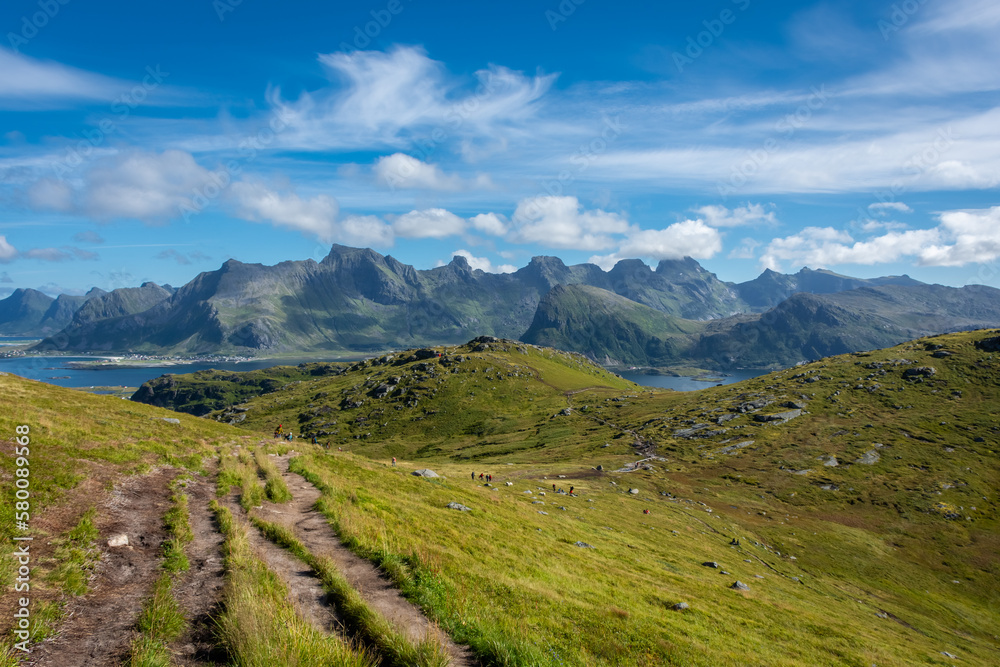 Obraz premium Hiking trail of Mount Ryten to go to Kvalvika Beach in the Lofoten Islands, Norway