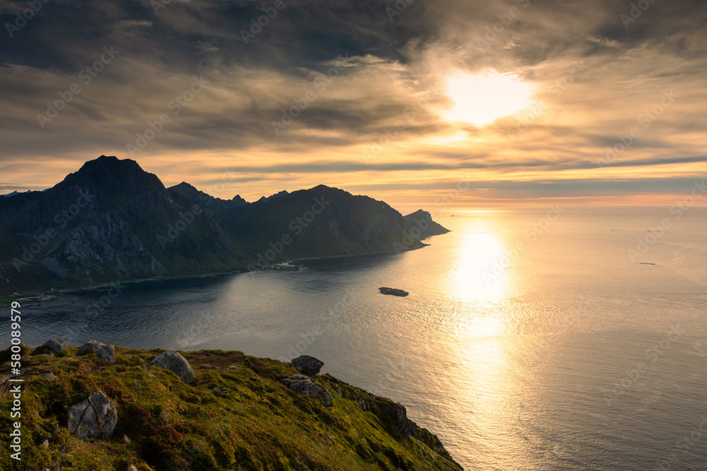 Beautiful sunset over the Norwegian Sea in the Lofoten Islands, Norway Beautiful sunset over the Norwegian Sea in the Lofoten Islands, Norway