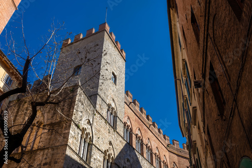 Medieval tower in Siena historic center, Italy