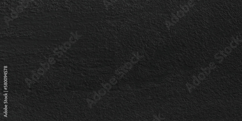 Black and dark grey rough grainy stone and concrete texture background. Wall grunge texture background. 