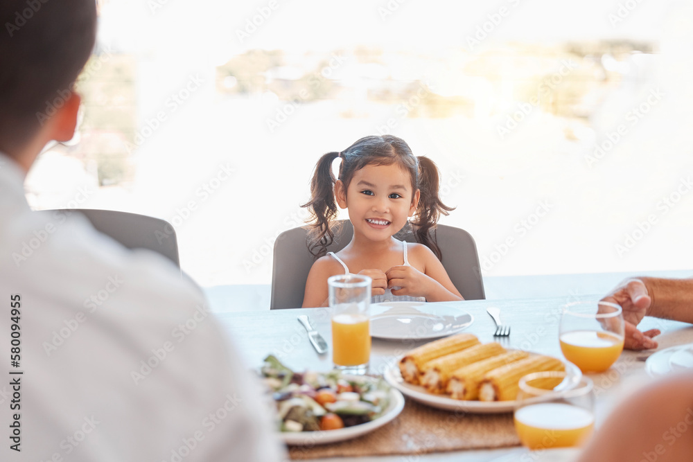 Child, girl or family lunch meal at dining table for holiday celebration, reunion or social gathering. Portrait, smile or happy kid with healthy food in house, home or restaurant and bonding at party Child, girl or family lunch meal at dining table for holiday celebration, reunion or social gathering. Portrait, smile or happy kid with healthy food in house, home or restaurant and bonding at party