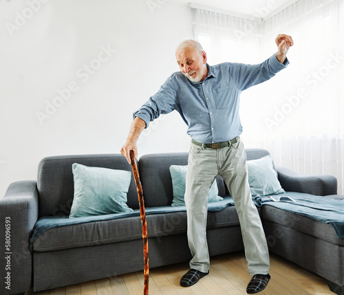 senior dance dancing vitality active healthy man walking cane stick fun retirement elderly happy cheerful alone active grey hair
