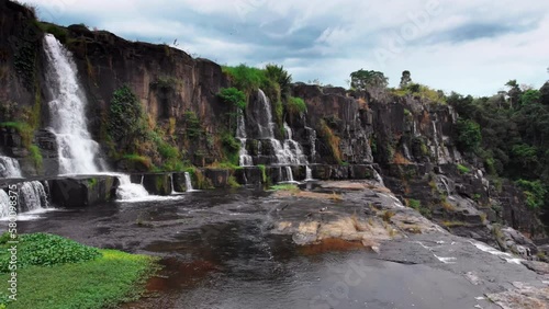 View scene stunning waterfall in the rainforest Pongour near Da Lat city, Vietnam photo