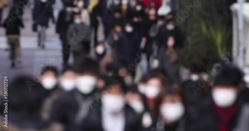 Wallpaper Mural A crowd of walking people on the city street defocused Torontodigital.ca