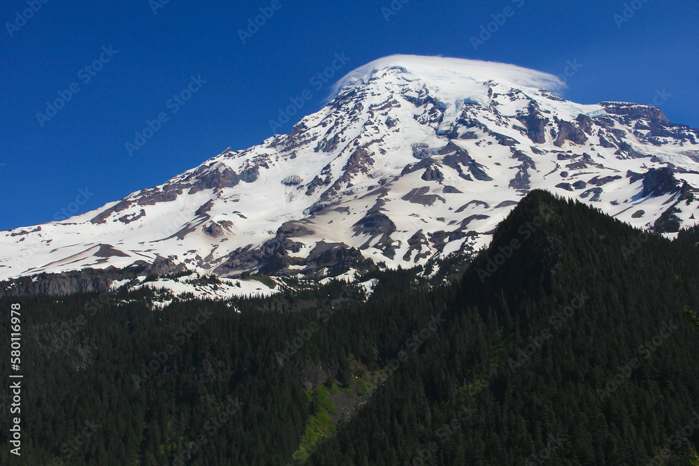 Fototapeta premium Mount Rainier National Park with blue sky and small cloud