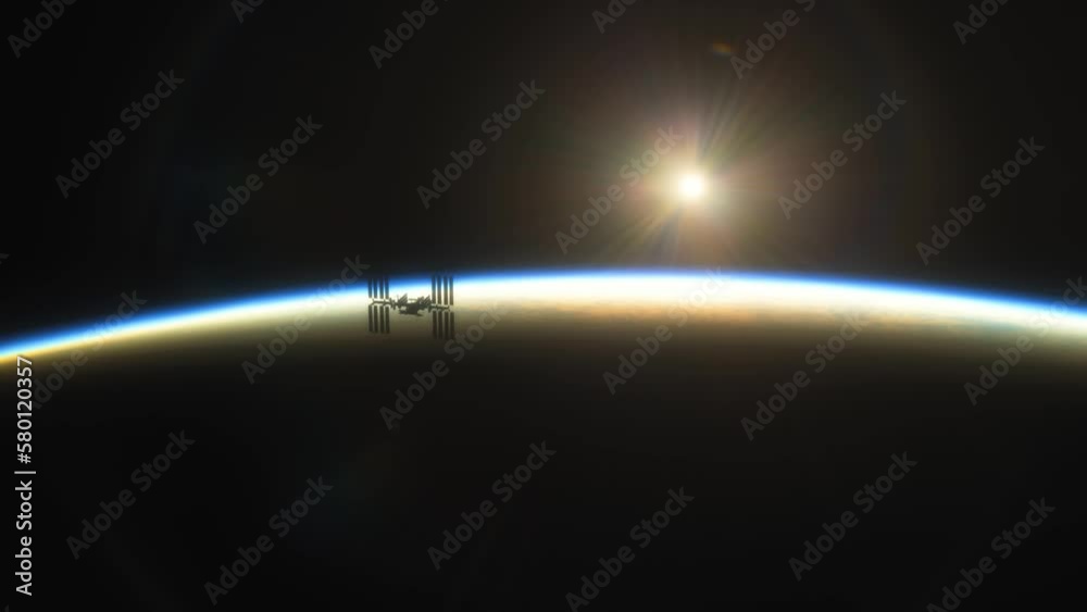International Space Station ISS Floating in Orbit above Planet Earth in outer space. Sunrise or sunset view from space
