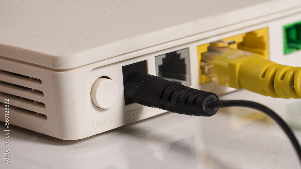computer lan network cable in the router closeup computer lan network cable in the router closeup