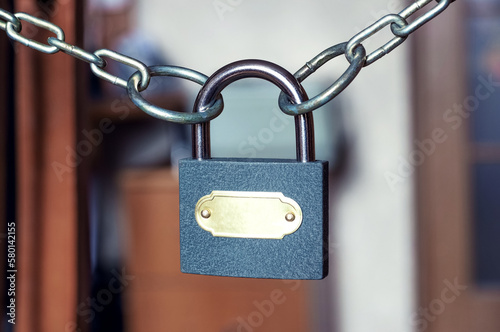 The lock connects the two parts of the chain