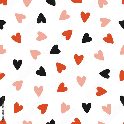 Seamless pattern with colorful hearts. Simple repeating texture with chaotic hearts. Love and romantic concept. Isolated vector illustration