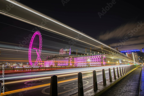 View of the London Eye from the Westminster Bridge during night