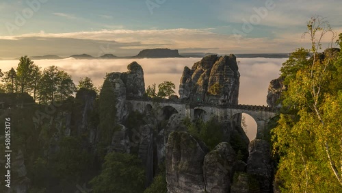 Sunrise Timelapse of Bastei Bridge in autumn, Saxon Switzerland, Germany.
