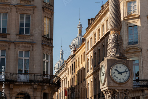 Fototapeta Naklejka Na Ścianę i Meble -  Old weathered vintage clock in the streets of Bordeaux