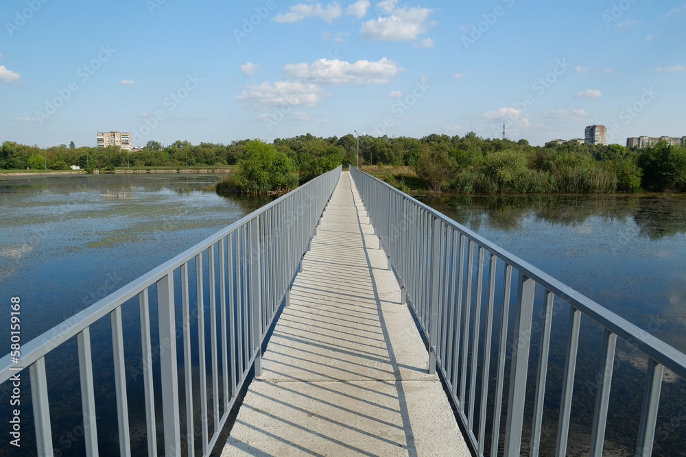Foot bridge over the lake in Ivano-Frankivsk city in western Ukraine