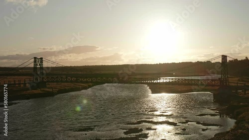 Atardecer en el puente sobre el lago en la patatagonia chilen a photo