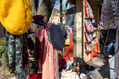 Shawls, scarves and other items for sale. Street market in Montenegro