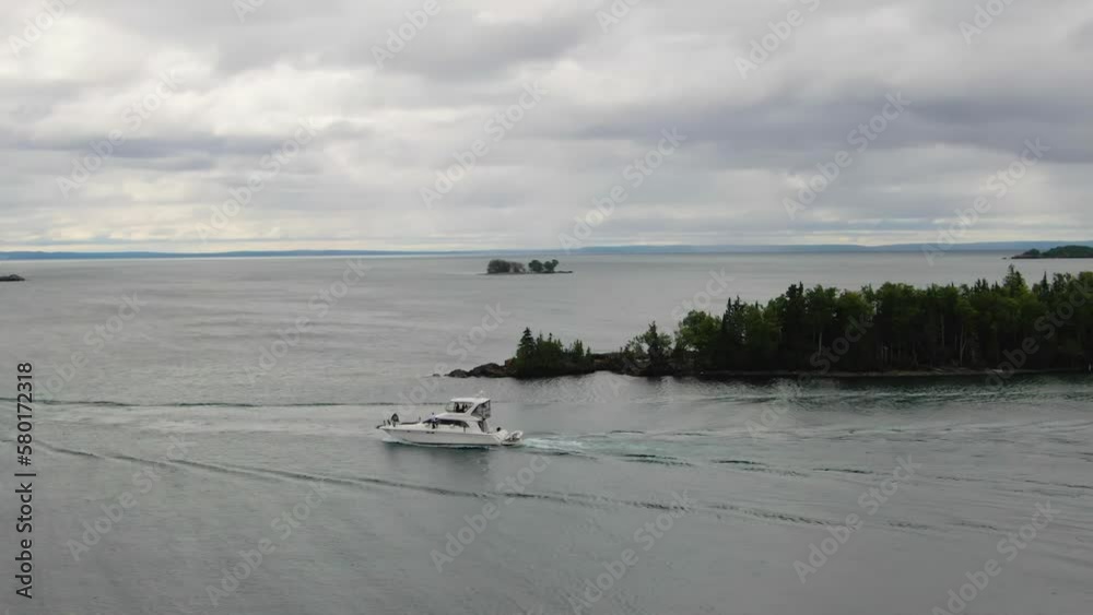 Fishing boat heading out into Lake Superior Canada Silver Islet Sleeping Giant Ontario Fishing boat heading out into Lake Superior Canada Silver Islet Sleeping Giant Ontario