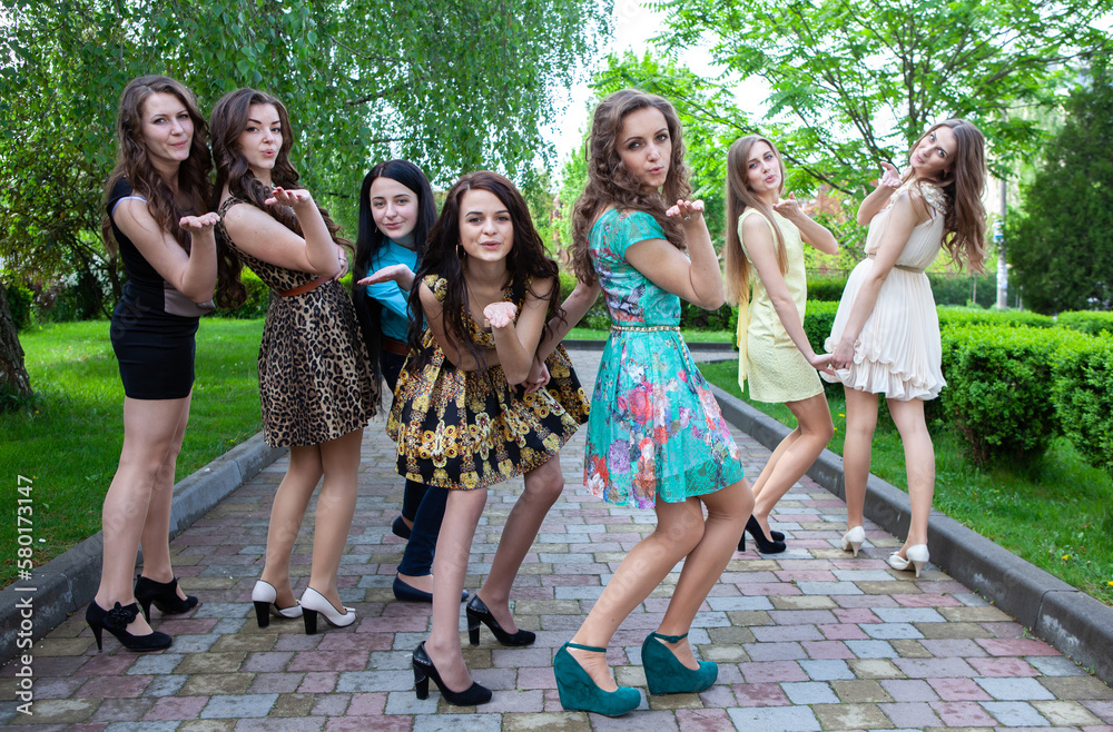 Fototapeta premium air kiss from group happy students