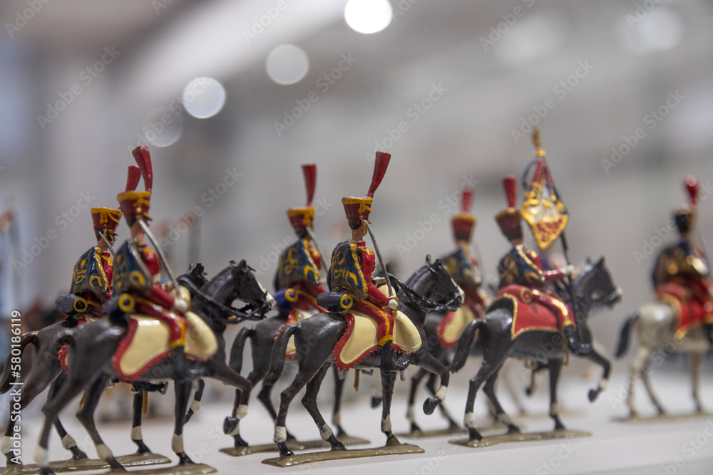 Small toy soldiers on horses
