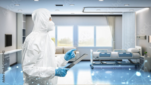 Billede på lærred Doctor wears medical protective suit or coverall suit with digital tablet