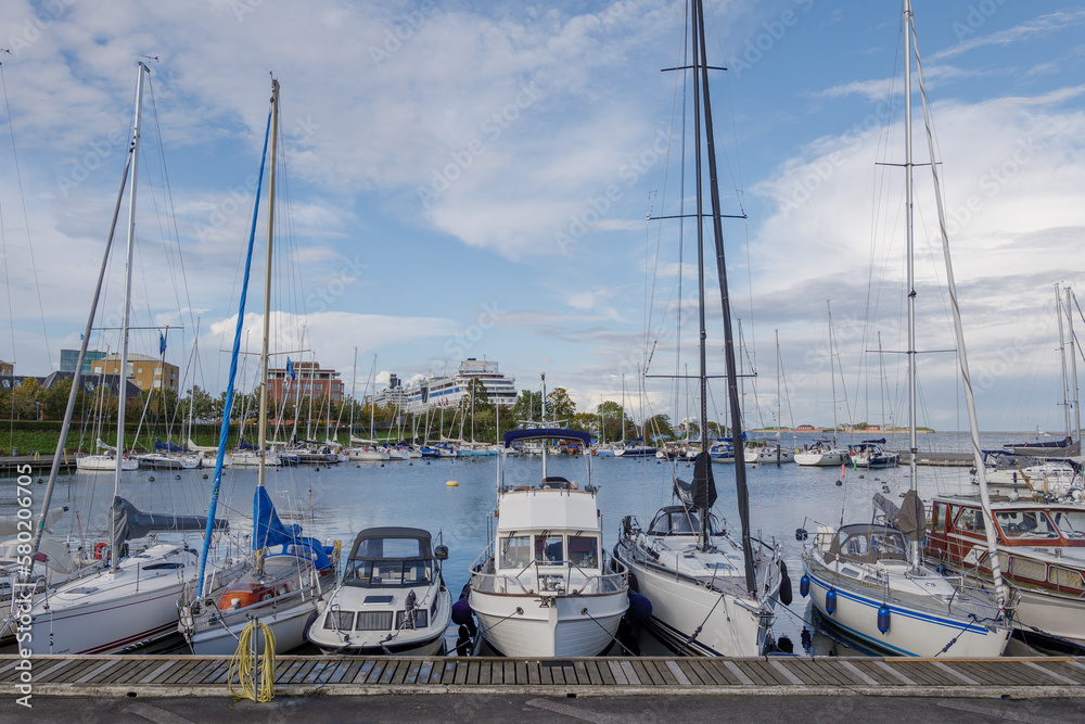 Outdoor scenery around LANGELINIE LYSTBÅDEHAVN marina and many boats wharf at the harbour in Copenhagen, Denmark. 
