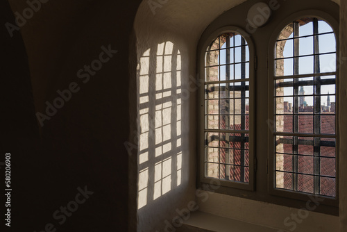 Interior view selective focus at window on the wall of spiral ramp at The Round Tower. 