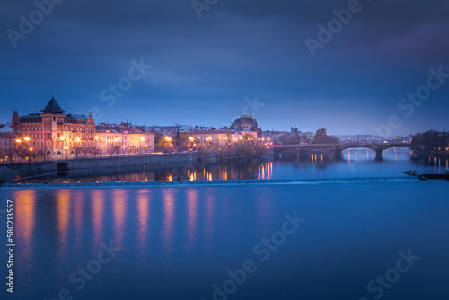 Panoramic view over the cityscape of Prague at dramatic dusk, Czech Republic