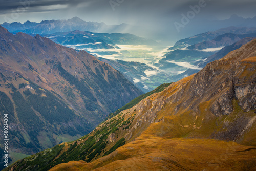 Hohe Tauern mountains and lake from above Grossglockner road at dawn, Austria © Aide