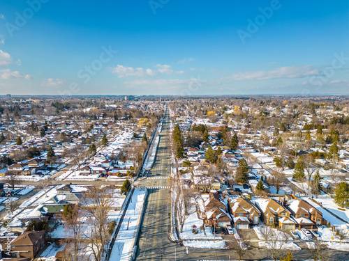 pickering ontario water  train tracks winter time blue skies and clouds drone view  photo