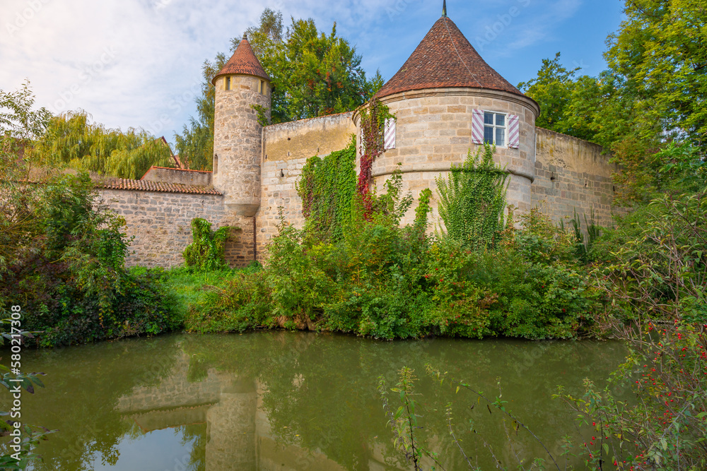 Dinkelsbuhl old town wall and lake, medieval village in Romantic road of Germany