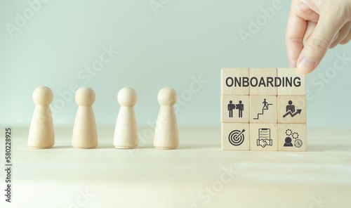 Onboarding new employee process concept. Ensuring that the new employees are able to hit the ground running with their new team. Staff induction practices and organizational socialization.