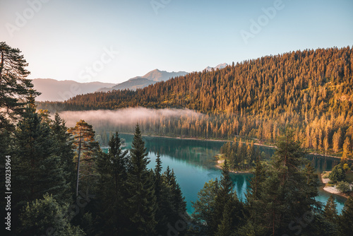 Sonnenaufgang am Caumasee in der Schweiz photo