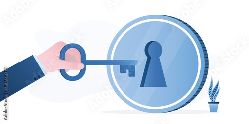 BIg businessman hand holds key to investing or financial wealth. Key success for money making. Open to investment opportunities. Investor holding key to unlock coin keyhole.